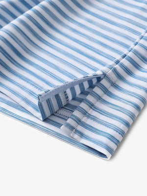 Hem slit detail of SKY BLUE WHITE polo highlighting light brushstroke texture and craftsmanship