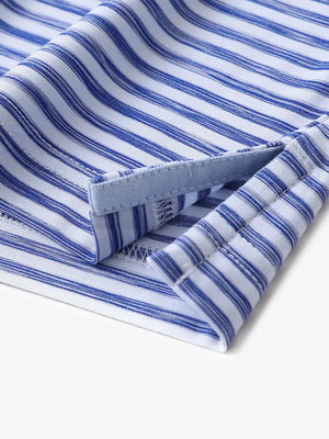 Close-up of hem slit detail on BLUE WHITE Unique Watercolour Stripe Polo