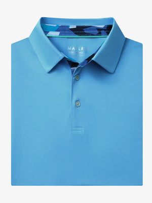 Folded Sky Blue Everyday Classic Solid Polo neatly laid out for display