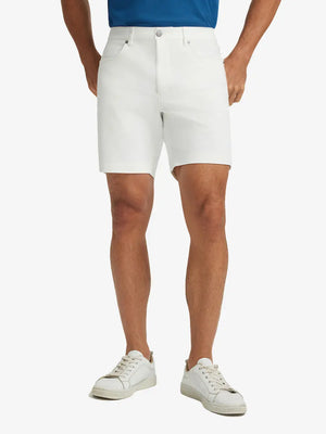 WHITE 4-way Stretch Performance Solid Shorts, golfer front lower body with club, 7 Inch view