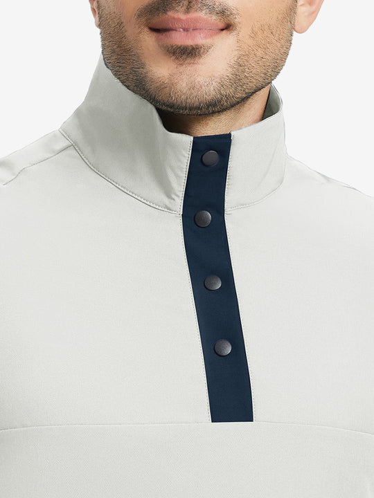 Close-up from nose to chest, highlighting buttoned collar and textured fabric of the silver gray pullover.