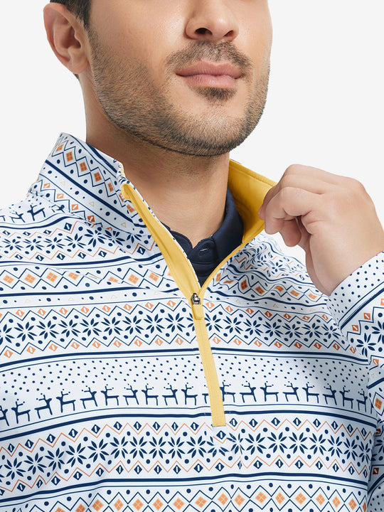 Close-up from nose to chest, showing zipper collar detail and fabric pattern of the christmas snowflake pullover.