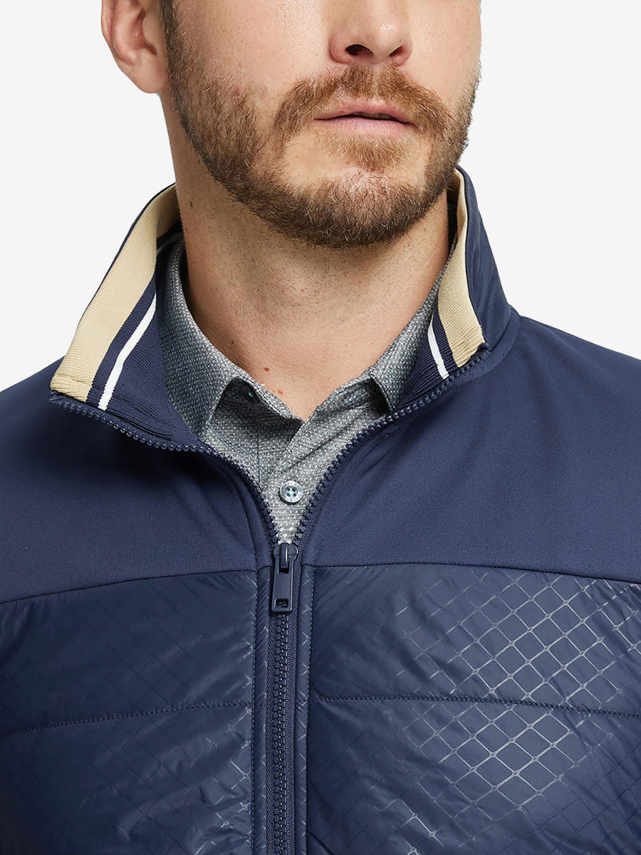 Close-up from nose to chest, showing collar detail and fleece texture of the Navy winter jacket.