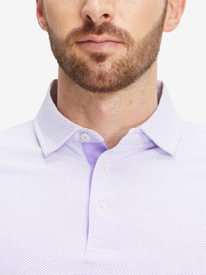 Close-up of a model wearing the lavender feather weight jacquard polo shirts, focusing on the collar and face