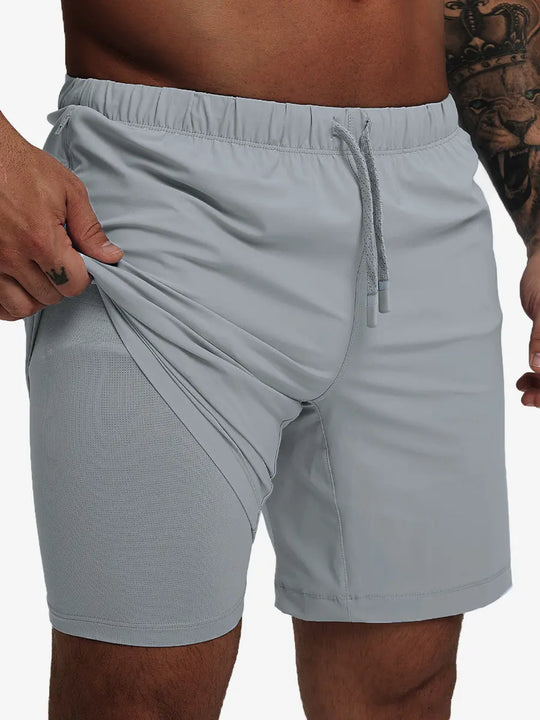Front lower-body view from waist to knees showing stretch of LIGHT GREY 2 in 1 Running Sports Shorts with Liner