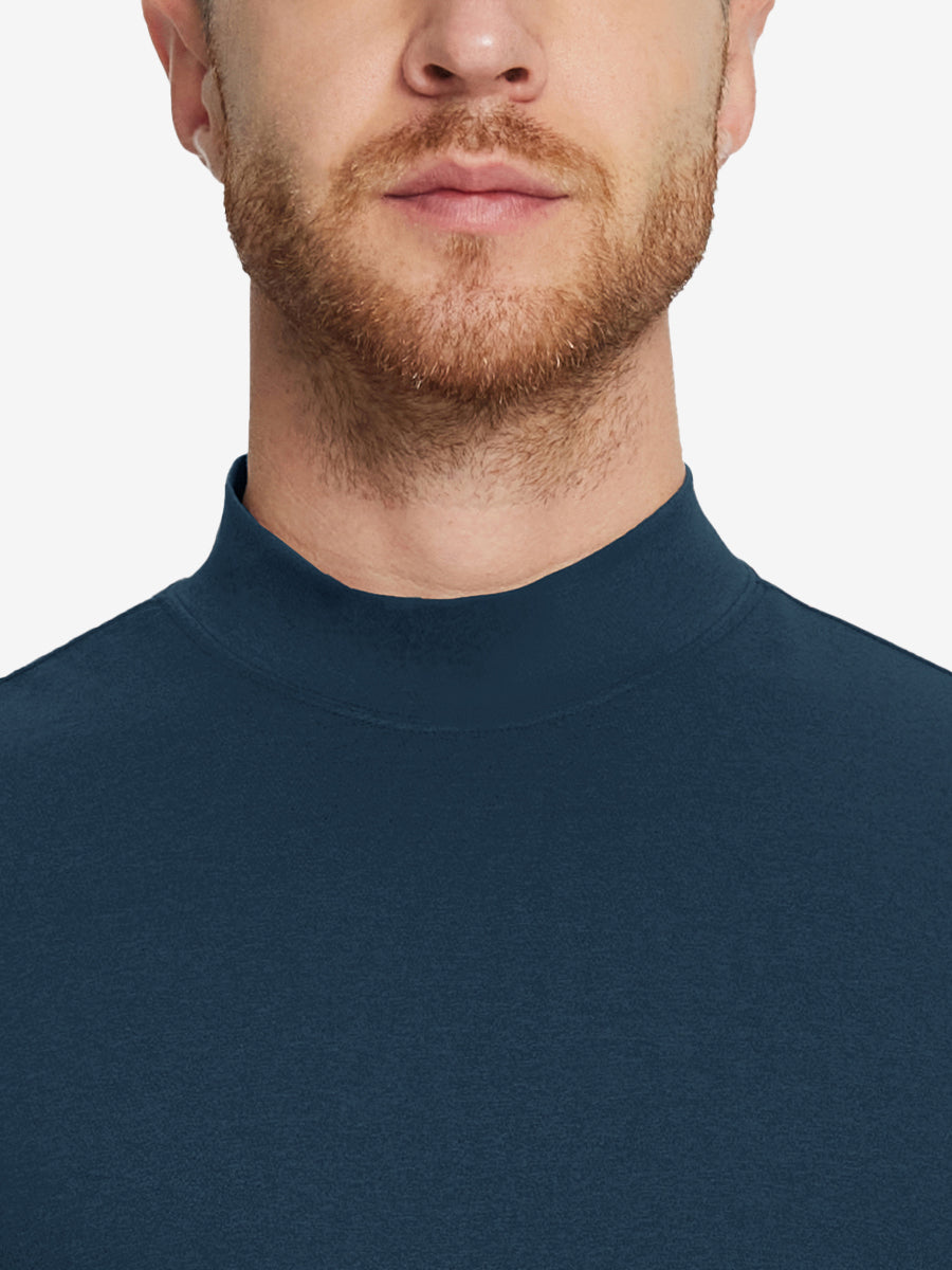 Close-up collar view from nose to chest, showing fine fabric texture of the Navy turtleneck.