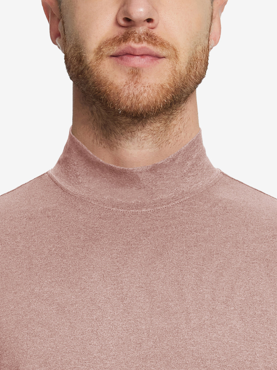 Close-up collar view from nose to chest, showing fine fabric texture of the Pink Heather turtleneck.
