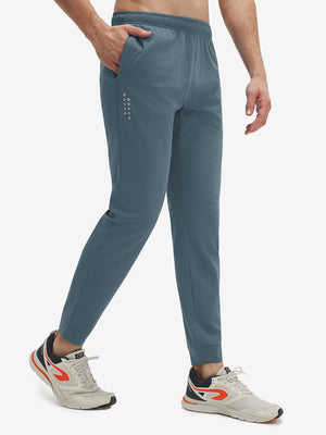 Front view of superion softness mesh joggers with zipper pockets in misty blue