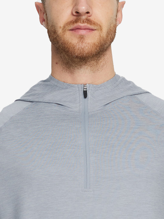 Close-up of collar detail from nose to chest, highlighting fabric and stitching of Faded Denim Heather hoodie.