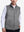 Front view of model showcasing neutral grey classic micro suede leather puffer vest