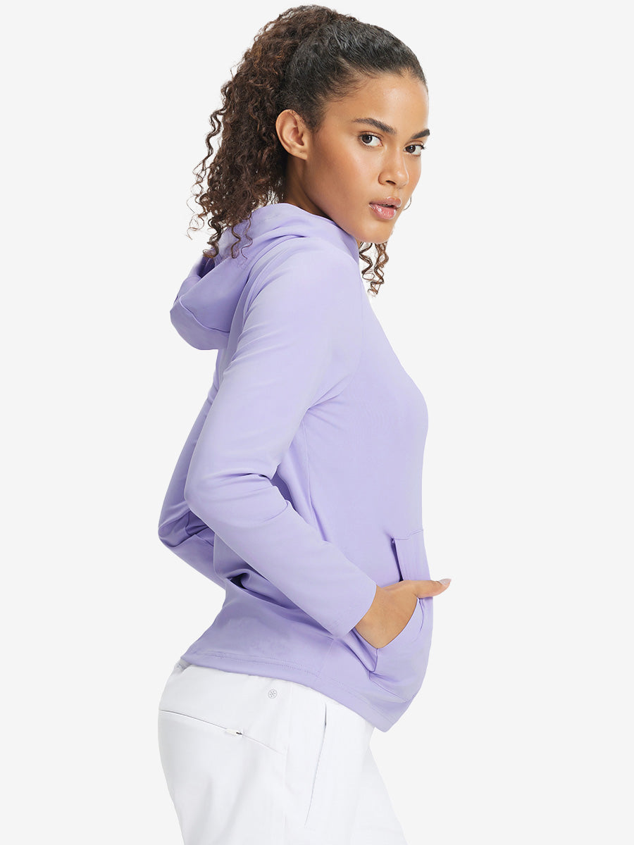 Model with one hand in side pocket wearing women's lightweight hoodies pullover in lavender.