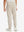 Model's lower body from the back, wearing light khaki fleece stretch water resistant boys joggers.