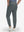 Back lower body shot of model wearing dark grey flat front golf joggers pants with belt loops