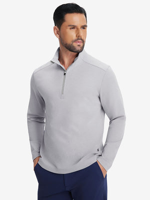 Front upper body shot of model in light grey two tone pique cotton blend q-zip