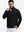Model front upper body wearing Fleece lined golf quarter zip with sleek black look