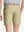 Back view of youth in khaki Heather Performance Golf Shorts, highlighting rear design and fit
