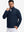 Model front upper body wearing Fleece lined golf quarter zip with sleek navy look