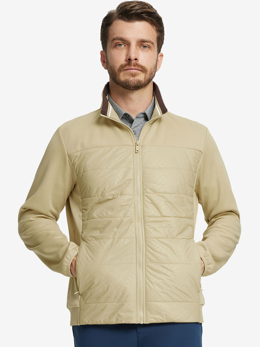 Front view of model with both hands in side pockets, wearing Golf Fleece Winter Jacket in Light Khaki.