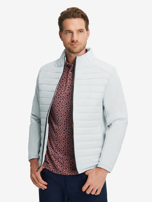 Front upper body shot of model wearing light grey heather warm puffer winter golf jackets