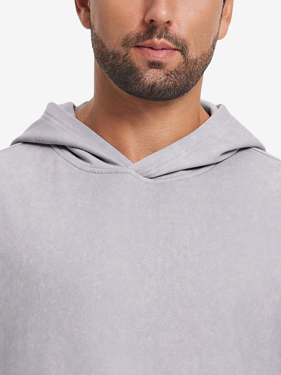 Close-up of neckline and drawstring area of the exclusive print kangaroo hoodies in light purple.