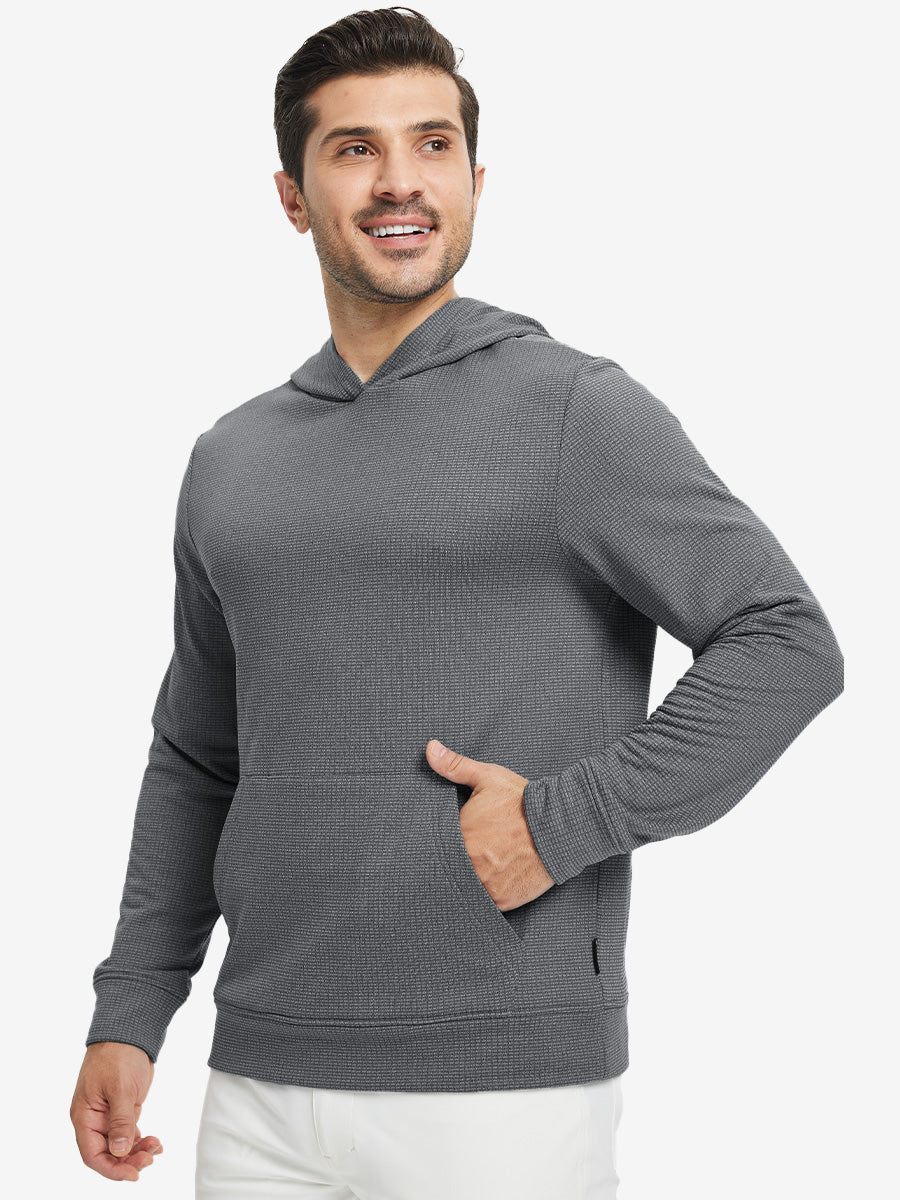 Model front view with one hand in side pocket wearing warm fleece golf hoodies pullover grey.