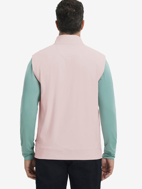 Back upper body view of the light pink print collar quarter zip golf vest, clean cut and relaxed posture.
