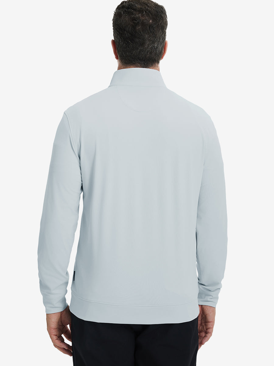 Back upper body view of the misty grey lightweight golf pullover, model turns head slightly with ease.