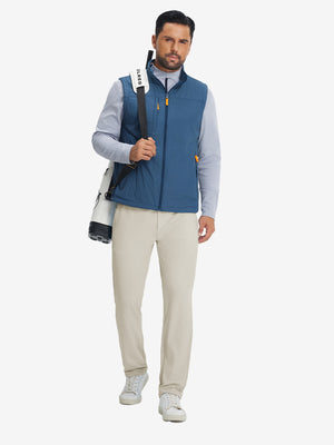 Model carrying a tennis bag, wearing cream soft lightweight casual golf pants with 5 pockets.