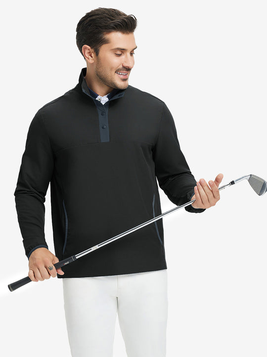Model holding golf club, wearing mock neck quarter button golf pullover in black, sporty look.