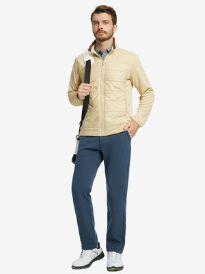 Full body model with bag, wearing water-resistant fleece lined pants in navy outdoors