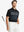 Model holding golf club in BLACK1 Chest Print Polo Shirts