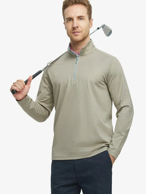 Half-body front view of model holding golf club in Pinstripe Quarter Zip Pullover – DARK KHAKI MELANGE