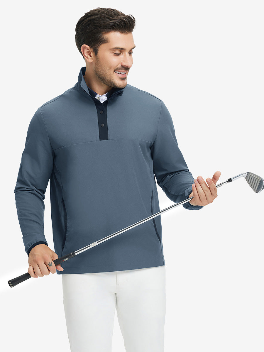 Model holding golf club, wearing mock neck quarter button golf pullover in misty blue, sporty look.