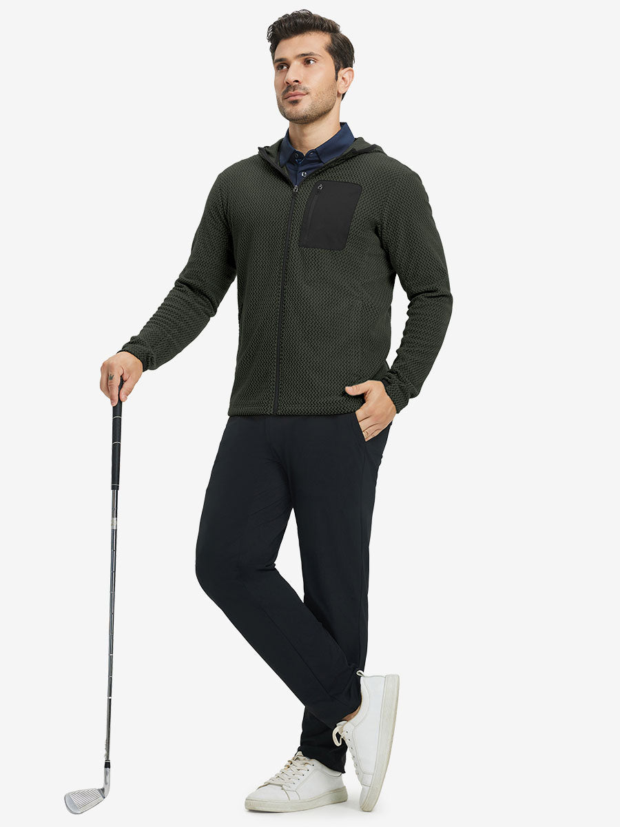 Model holding golf club, dressed in full zip fleece hoodied jacket in forest green, sporty and casual.