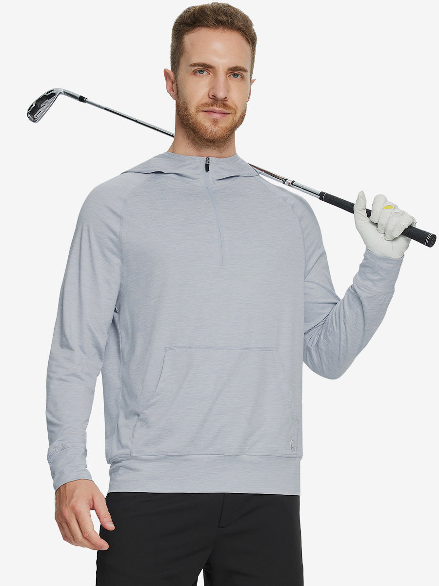 Male model holding a golf club, wearing the Quarter Zip Hoodie with Kangaroo Pocket in Faded Denim Heather.