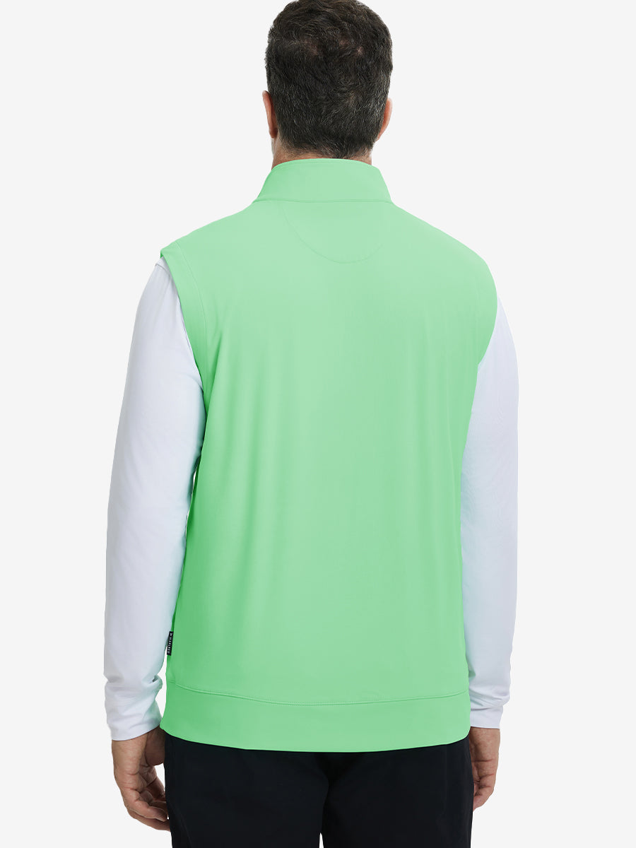 Back upper body view of the dark grey print collar quarter zip golf vest, clean cut and relaxed posture.