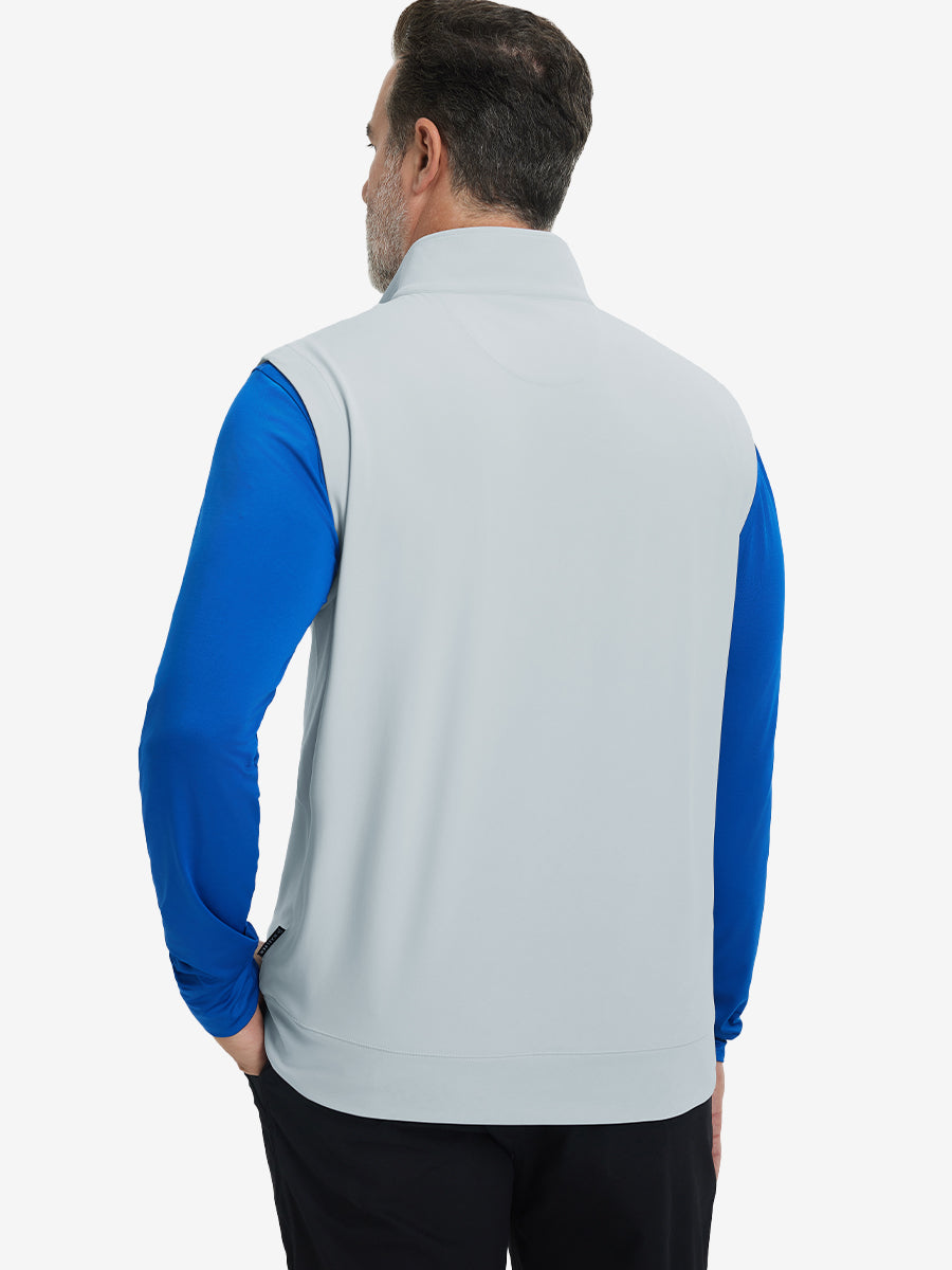 Back upper body view of the misty grey print collar quarter zip golf vest, clean cut and relaxed posture.