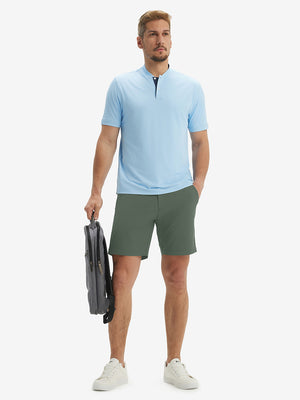 Full-body front view of model wearing the grey green stretch soft flat front dress golf shorts for a complete look
