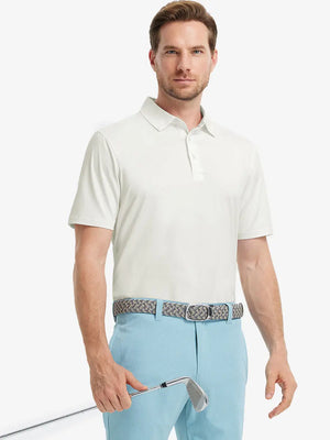 Model poses in Everyday Solid Jersey Polo in CREAM, front half-body with golf club in hand.