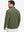 Back upper view of model in midweight warm stretchy quarter zip pullover, highlighting shoulder fit in green.