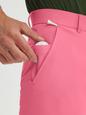 Detail shot of the side pocket on the peach pink stretch soft flat front dress golf shorts, showing functionality