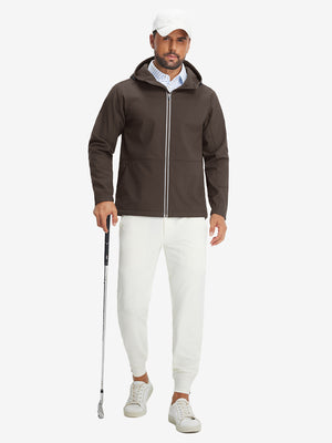Model holding a golf club, wearing coffee brown reflective hooded softshell jacket in full-body view.