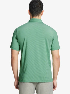 Model in EMERALD STRIPE Pinstripe Jersey Performance Polo holding golf club, front half-body view								
