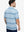 Back half-body view of model in BLUE WHITE STRIPE Performance Yarn Dye Striped Polo