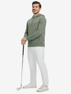 Model full-body view holding a golf club wearing warm fleece golf hoodies pullover in green.