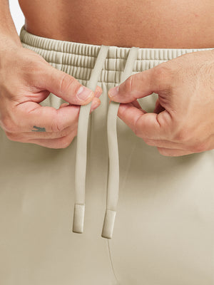 Front waistband detail of Water Resistant Comfy Fleece Golf Joggers in light khaki