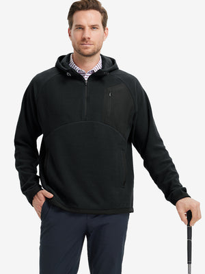 Model holding a golf club, dressed in Black Quarter Zip Polar Fleece Sweatshirt, sporty fit.