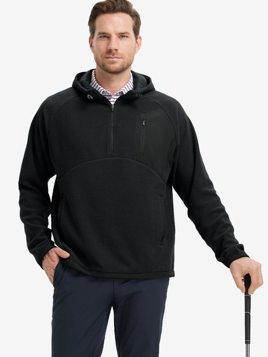 Model holding a golf club, dressed in Black Quarter Zip Polar Fleece Sweatshirt, sporty fit.