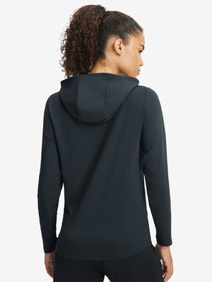 Back upper view of model in women's lightweight hoodies pullover, showing relaxed fit in dark grey.