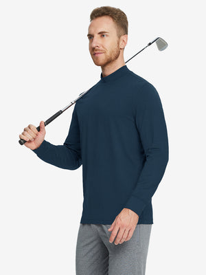 Model holding a golf club while wearing the Navy Long Sleeve Mock Turtleneck Shirt.